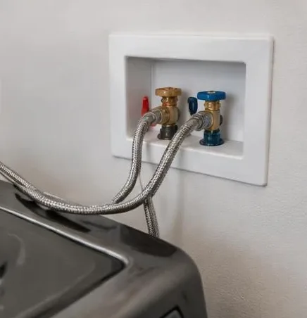 Water heater installed beside a South Florida home — Plumbing in Gulf Stream