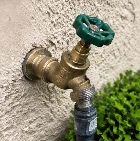 Water heater installed beside a South Florida home — Plumbing for homeowners
