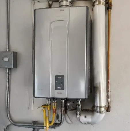 Water heater installed beside a South Florida home — Plumbing for facility managers
